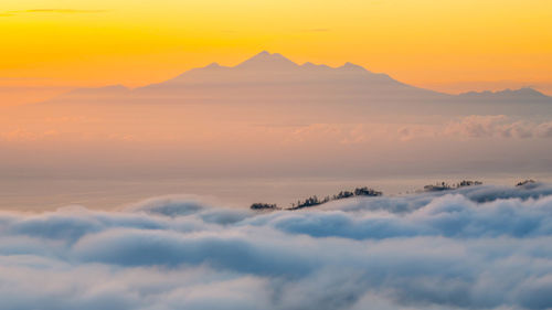 Sunrise view of mount agung from mount batur in bali