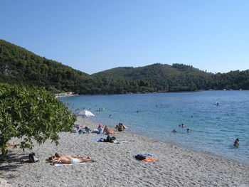 Scenic view of calm sea against clear sky