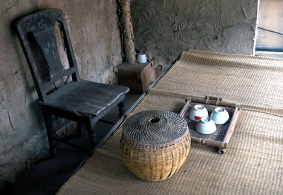 High angle view of empty chairs and table