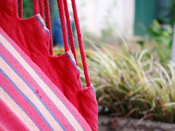 Close-up of red hanging outdoors