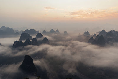 Mountain peaks with clouds at sunrise, guilin, china