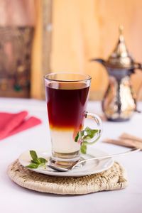 Close-up of tea cup on table