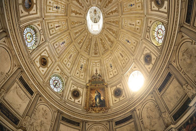 Low angle view of illuminated ceiling of building