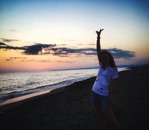 Scenic view of sea at sunset