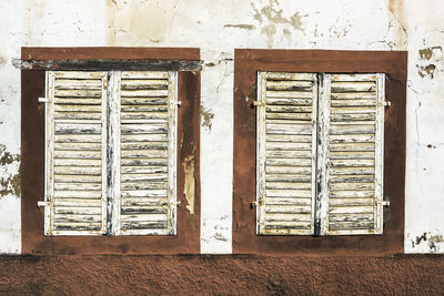 Closed window of old building