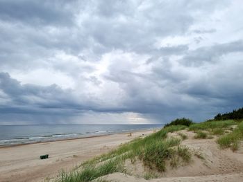 Scenic view of beach against sky