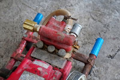 High angle view of various toys on metal