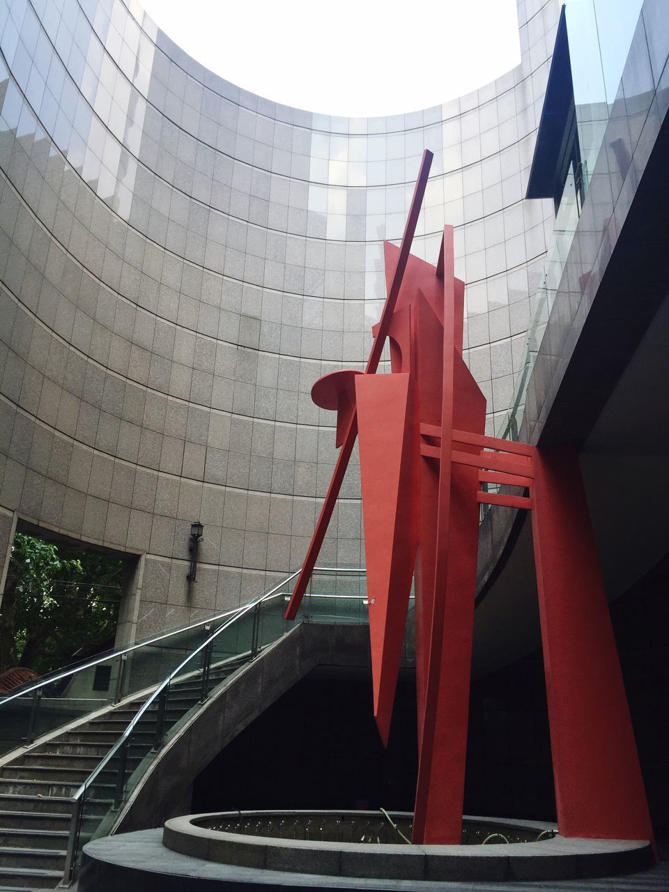 architecture, low angle view, built structure, red, building exterior, day, outdoors, place of worship, city life, no people