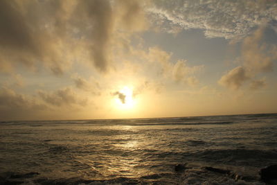 Scenic view of sea at sunset