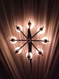 Low angle view of illuminated chandelier