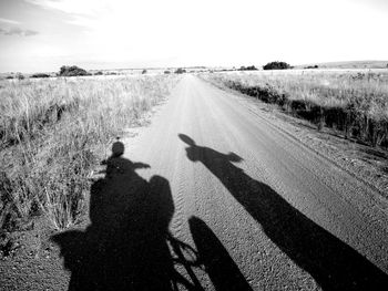 Shadow of people on ground