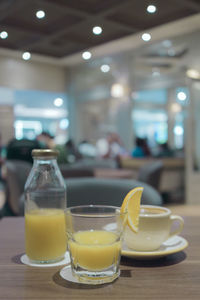 Close-up of beer glass on table in restaurant