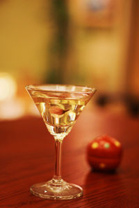 Close-up of wineglass on table