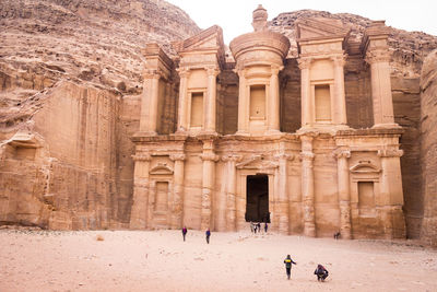 Group of people in front of historical building