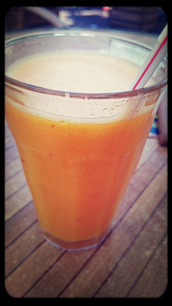 drink, food and drink, refreshment, table, close-up, drinking glass, indoors, transfer print, freshness, still life, auto post production filter, focus on foreground, drinking straw, wood - material, alcohol, no people, glass - material, red, frothy drink, selective focus