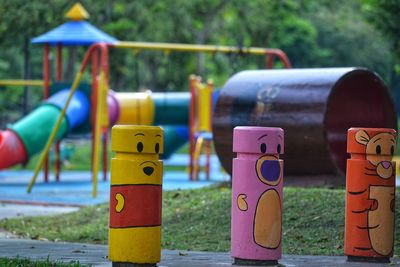 Roadblocks are decorated with cartoon drawings in the recreation area