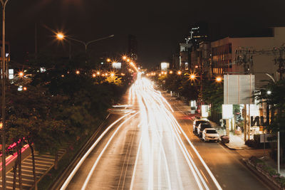 Light trails on city street at night