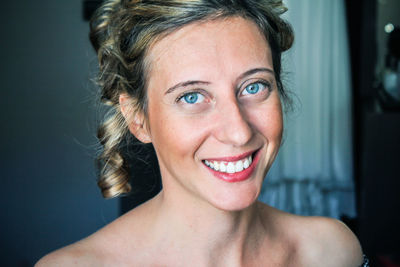 Close-up portrait of smiling woman