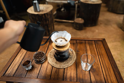 High angle view of coffee cup on table