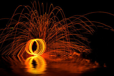 View of illuminated wire wool at night