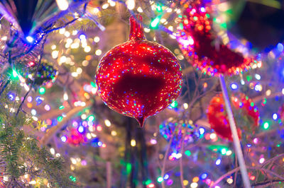 Illuminated christmas tree at night