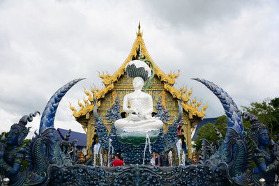 Statue of temple against sky