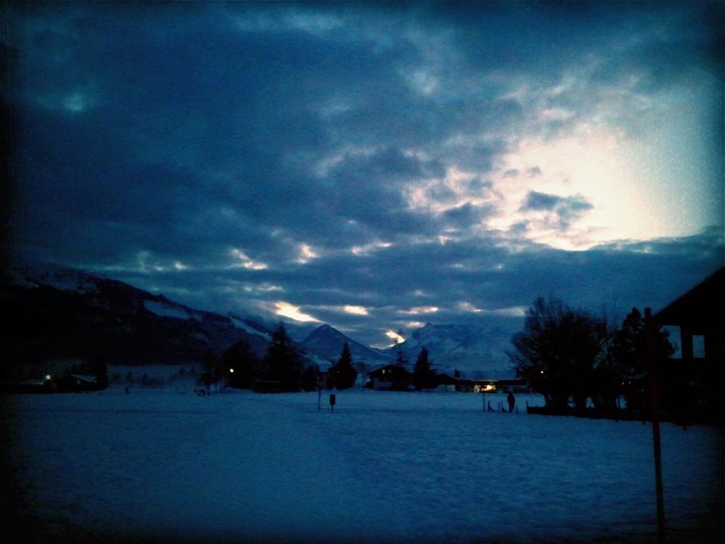 winter, snow, mountain, cold temperature, sky, weather, cloud - sky, scenics, tranquil scene, beauty in nature, tranquility, mountain range, season, cloudy, nature, cloud, dusk, water, landscape, tree