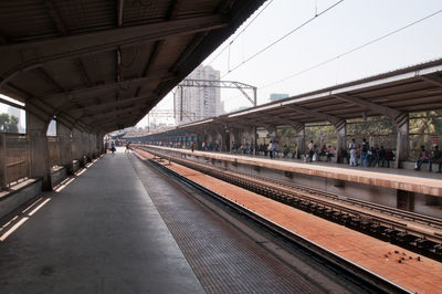 Railroad station platform against sky