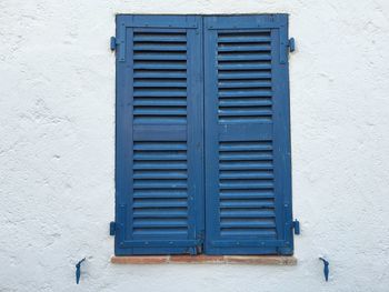 Close-up of closed shutter window