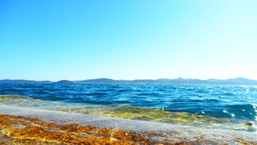 View of sea against blue sky