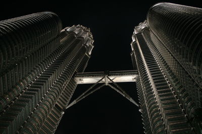 Low angle view of illuminated city at night