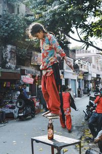 Woman standing in city