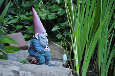 Close-up of statue against plants