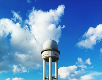 Low angle view of building against blue sky