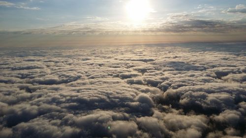 Aerial view of clouds over sea during sunset
