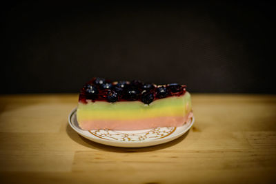 Close-up of cake served on table