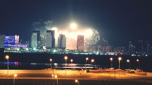 Illuminated cityscape at night
