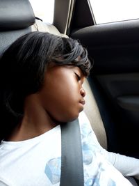 Portrait of woman in car