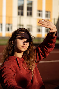 Portrait of teenage girl looking at camera