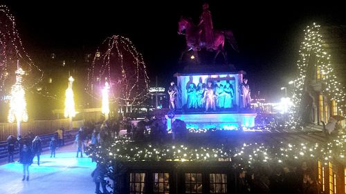 View of illuminated city at night