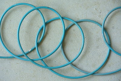 High angle view of blue cable on floor