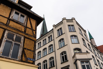 Low angle view of buildings against clear sky