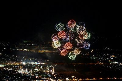 Firework display at night