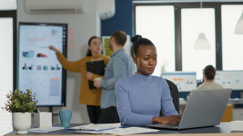 Business colleagues working at office