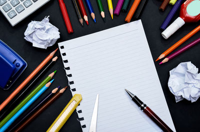 High angle view of multi colored pencils on table