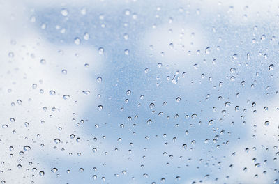 Full frame shot of wet glass window