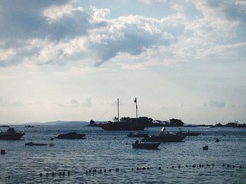 Scenic view of sea against cloudy sky