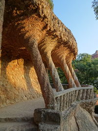 Low angle view of rock formation against sky