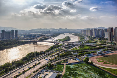 High angle view of elevated road amidst buildings in city