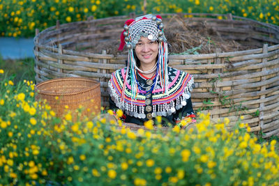 Portrait of a smiling young woman in park